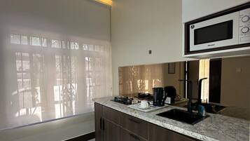 Chambre Deluxe | Cuisine privée
