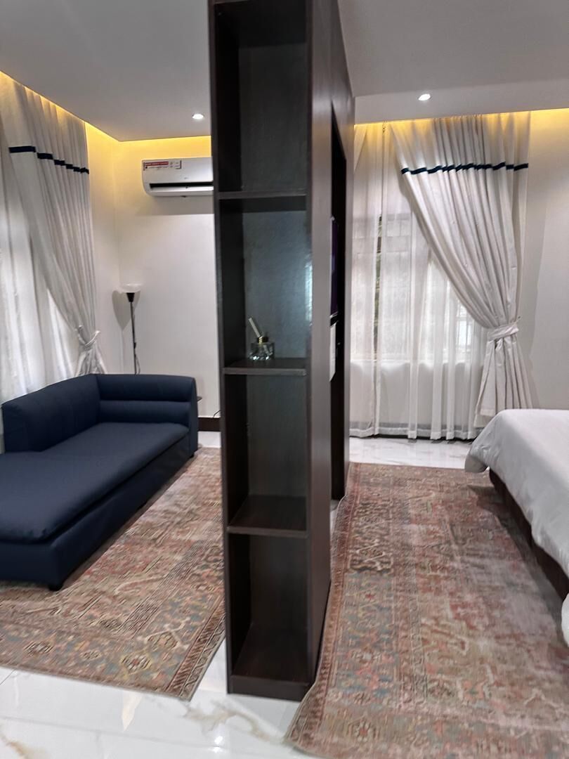 Suite monolocale Premium | Area soggiorno | TV a schermo piatto