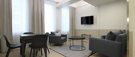 Apartment, 2 Bedrooms (for 6) | Living area | Flat-screen TV