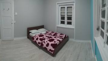 Economy Double Room, Shared Bathroom | Blackout curtains, free WiFi, bed sheets