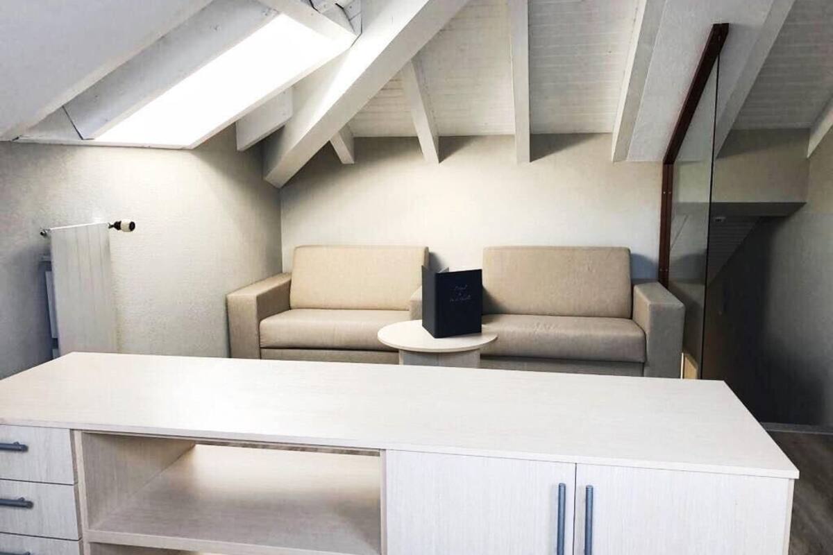 family room | 1 bedroom, individually decorated, individually furnished, desk