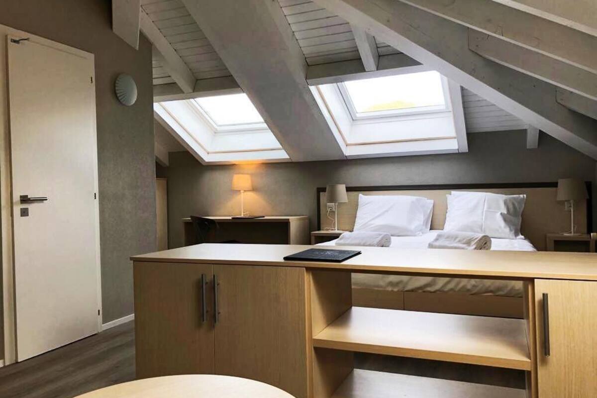 family room | 1 bedroom, individually decorated, individually furnished, desk