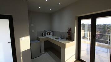 Comfort Room | Private kitchenette | Electric kettle