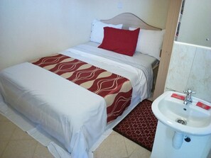 Standard Single Room | Free WiFi, bed sheets - Comi Village Hotel (Naivasha)
