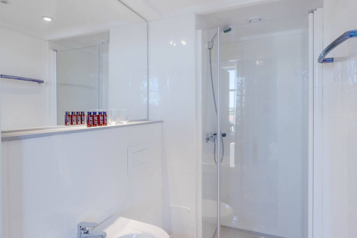 grand double or twin room | bathroom | shower, towels