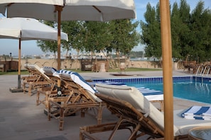 Outdoor pool, pool umbrellas, pool loungers