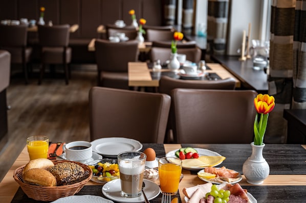 Daily buffet breakfast (EUR 18 per person)