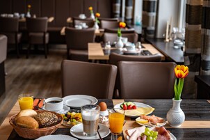 Daily buffet breakfast (EUR 18 per person)