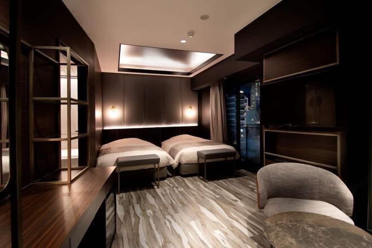Blackout curtains, soundproofing, free WiFi, bed sheets
