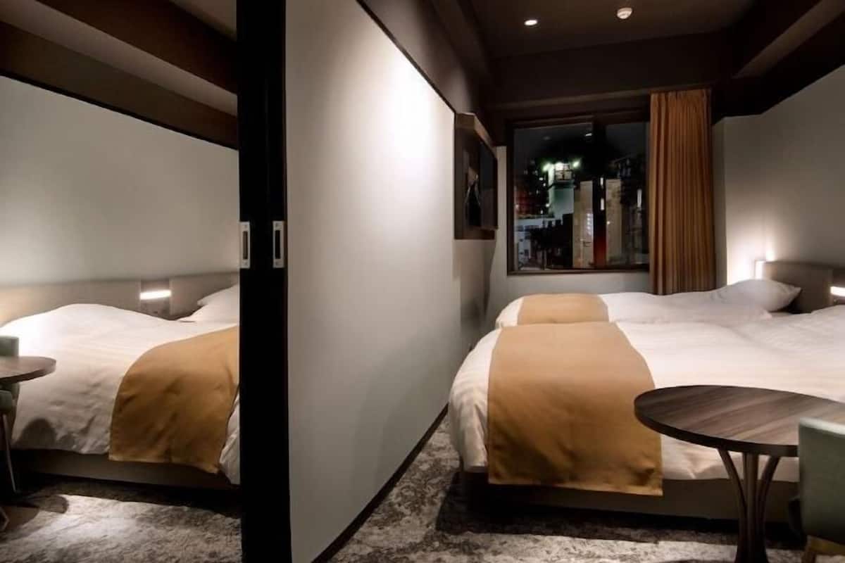Blackout curtains, soundproofing, free WiFi, bed sheets