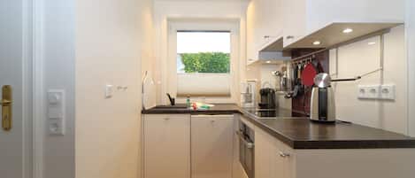 Fridge, oven, coffee/tea maker, toaster