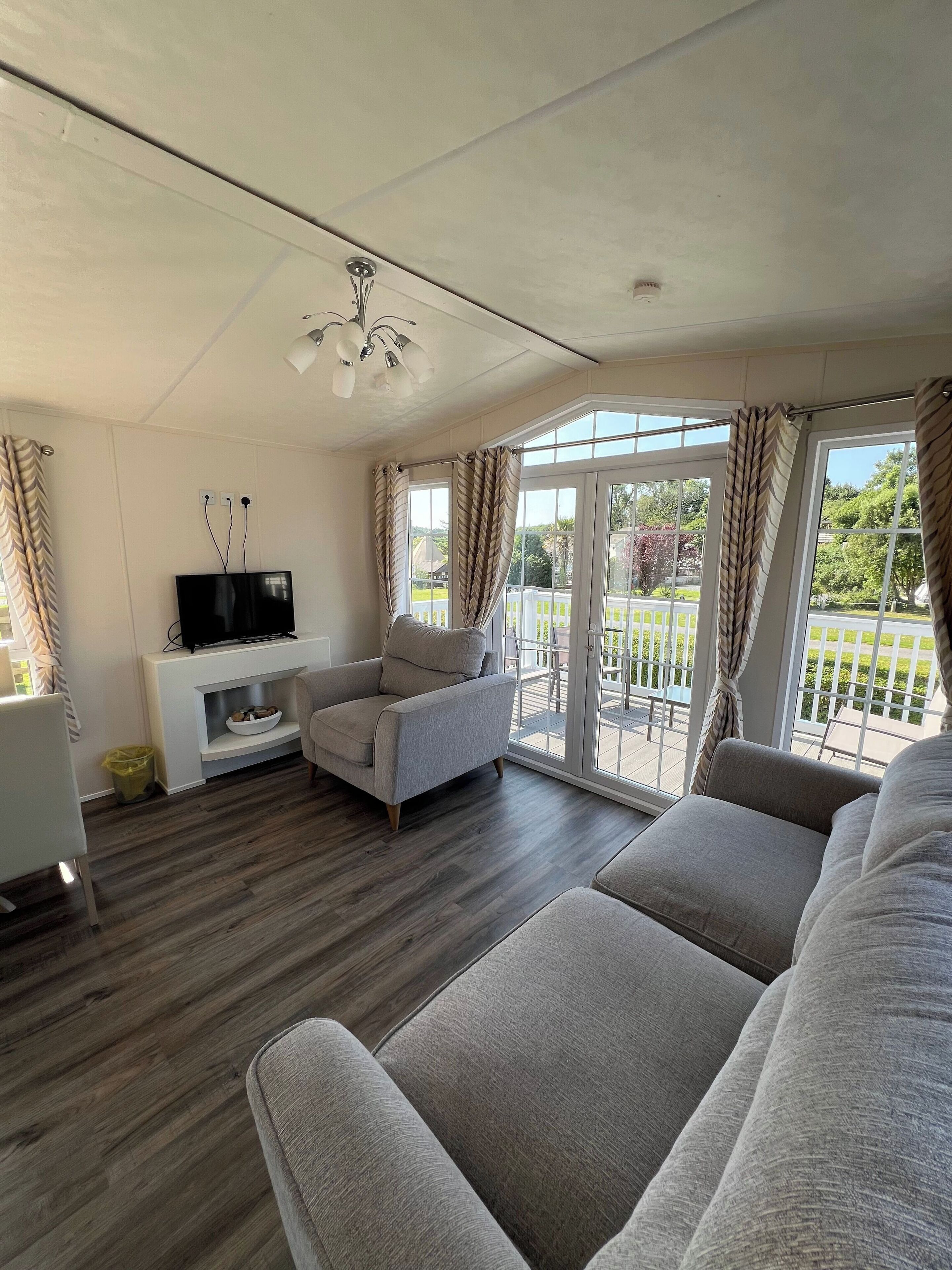 Signature 2 Bedroom | Living area | 42-inch Smart TV with satellite channels, streaming services