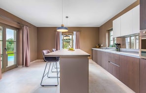 Villa, 4 Bedrooms | Private kitchen | Fridge, microwave, oven, stovetop