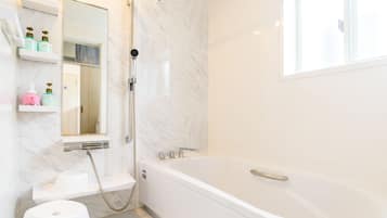 Free toiletries, hair dryer, slippers, electronic bidet