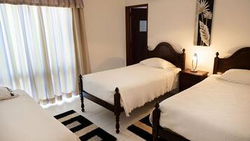 Desk, blackout curtains, free WiFi, bed sheets