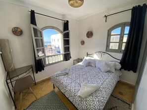 Shower, rainfall showerhead, hair dryer, towels