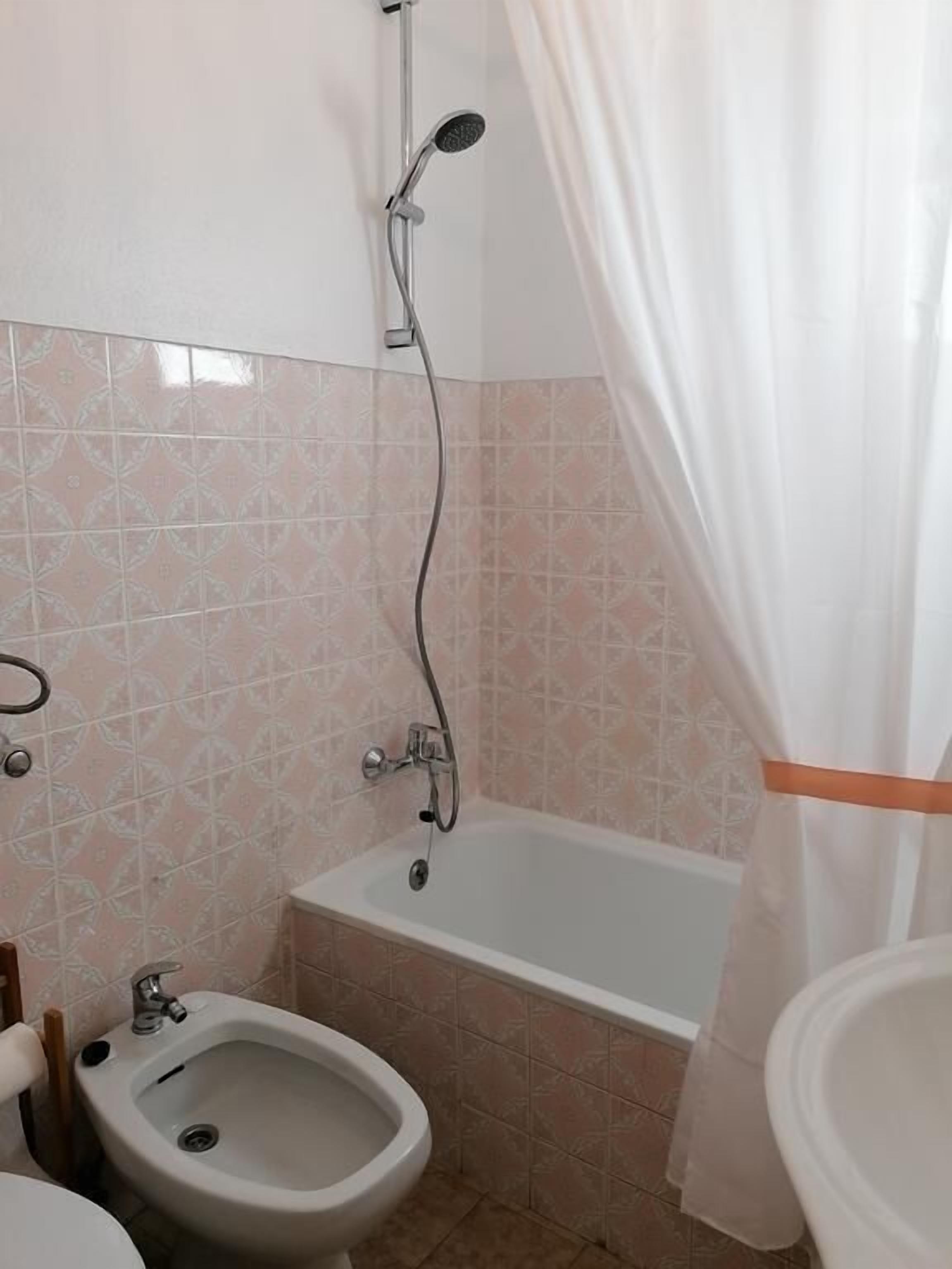 Shower, towels, soap, shampoo