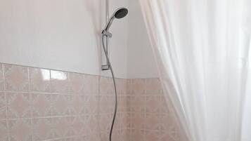 Shower, towels, soap, shampoo