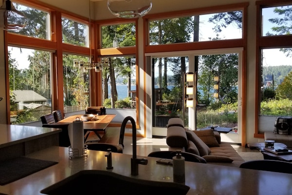 kitchen, living and dining room in a great room