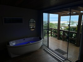 Serpens (B5) com Banheira de Imersão privativa - Chalés e Bangalôs Ibiraquera | Vista para praia/oceano