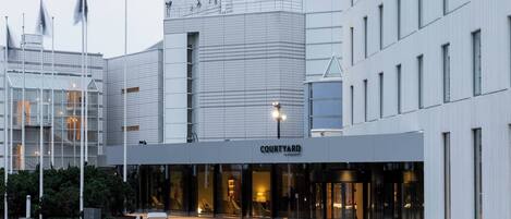 A modern building with a sign reading "COURTYARD."