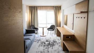 Deluxe Double Room | Minibar, desk, laptop workspace, blackout drapes