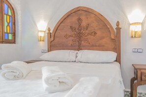 Verduisterende gordijnen, gratis wifi, beddengoed