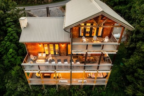 Enjoy a forest view from the multiple balconies with outdoor seating areas.