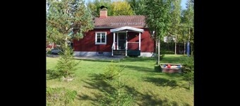 Maison de vacances dans le village forestier sur le lac