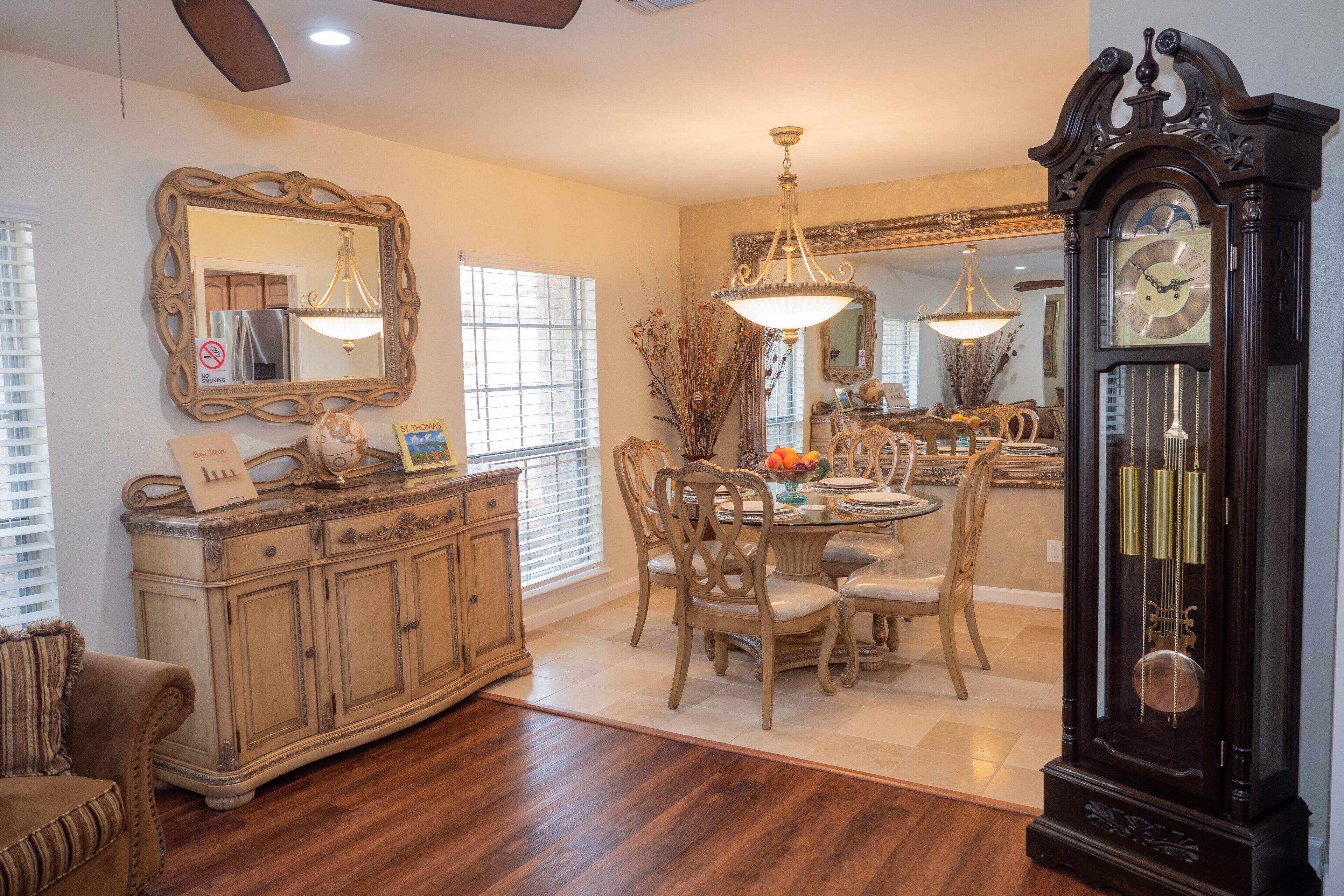 The dining room can seat 4 individuals and the other table can seat 4 more. 