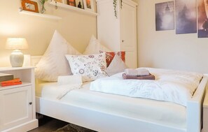 2 bedrooms, desk, iron/ironing board, travel cot