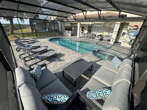 Outdoor pool, a heated pool, sun loungers