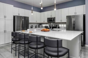 Fridge, microwave, oven, stovetop - Grand Villa w/ Princess & Wizard Themed BRs, Theater, Arcade & Pool - Near Parks (Davenport)