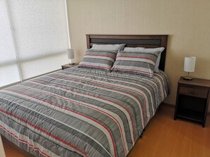 1 habitación, tabla de planchar con plancha, wifi y ropa de cama 