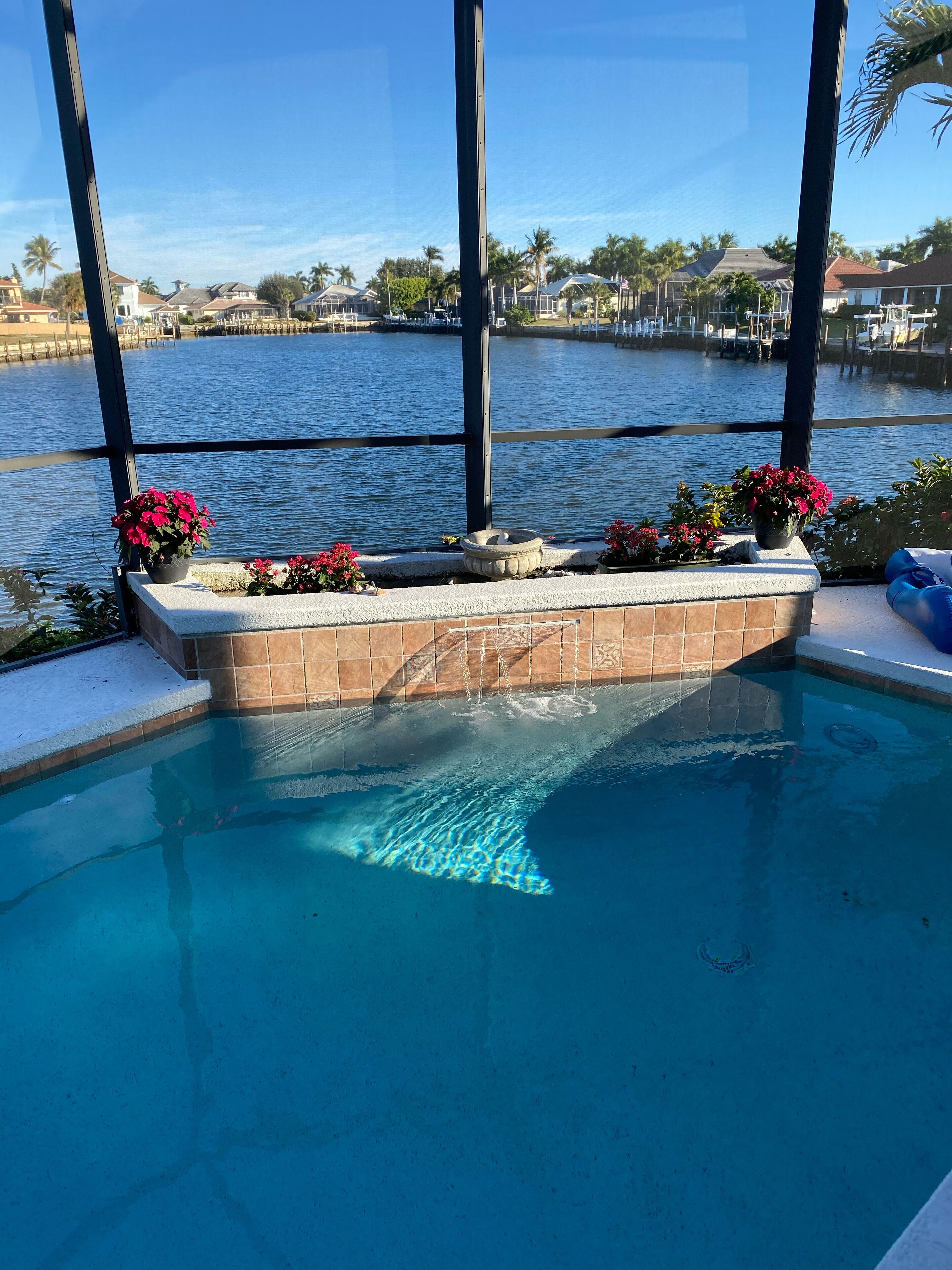 Bay view home on a tip lot- recently updated. Great location. Private pool. 