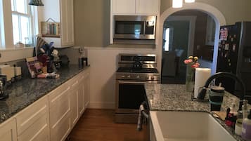 Fridge, coffee/tea maker, toaster, cookware/dishes/utensils