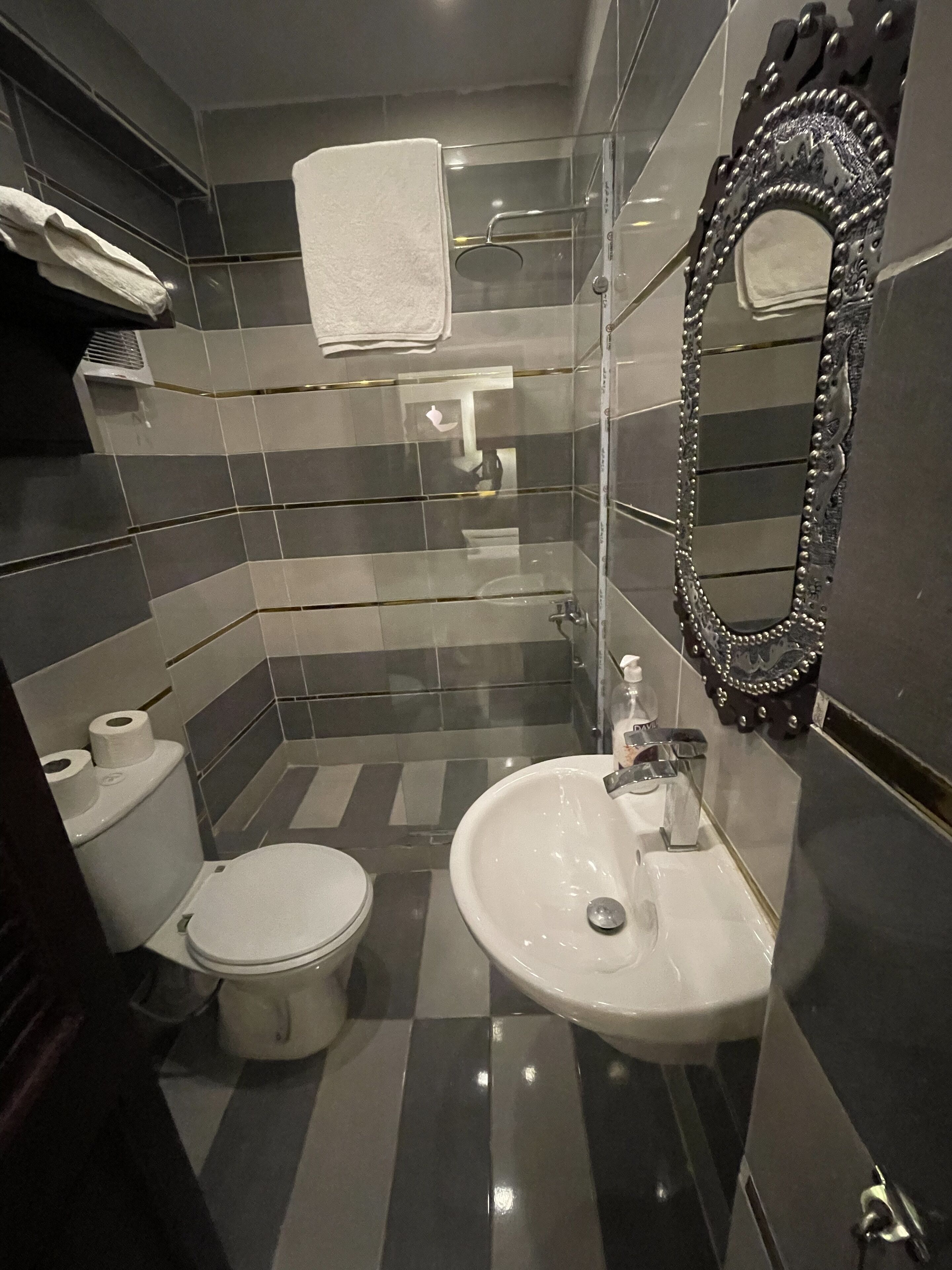 shower, rainfall showerhead, bathrobes, slippers