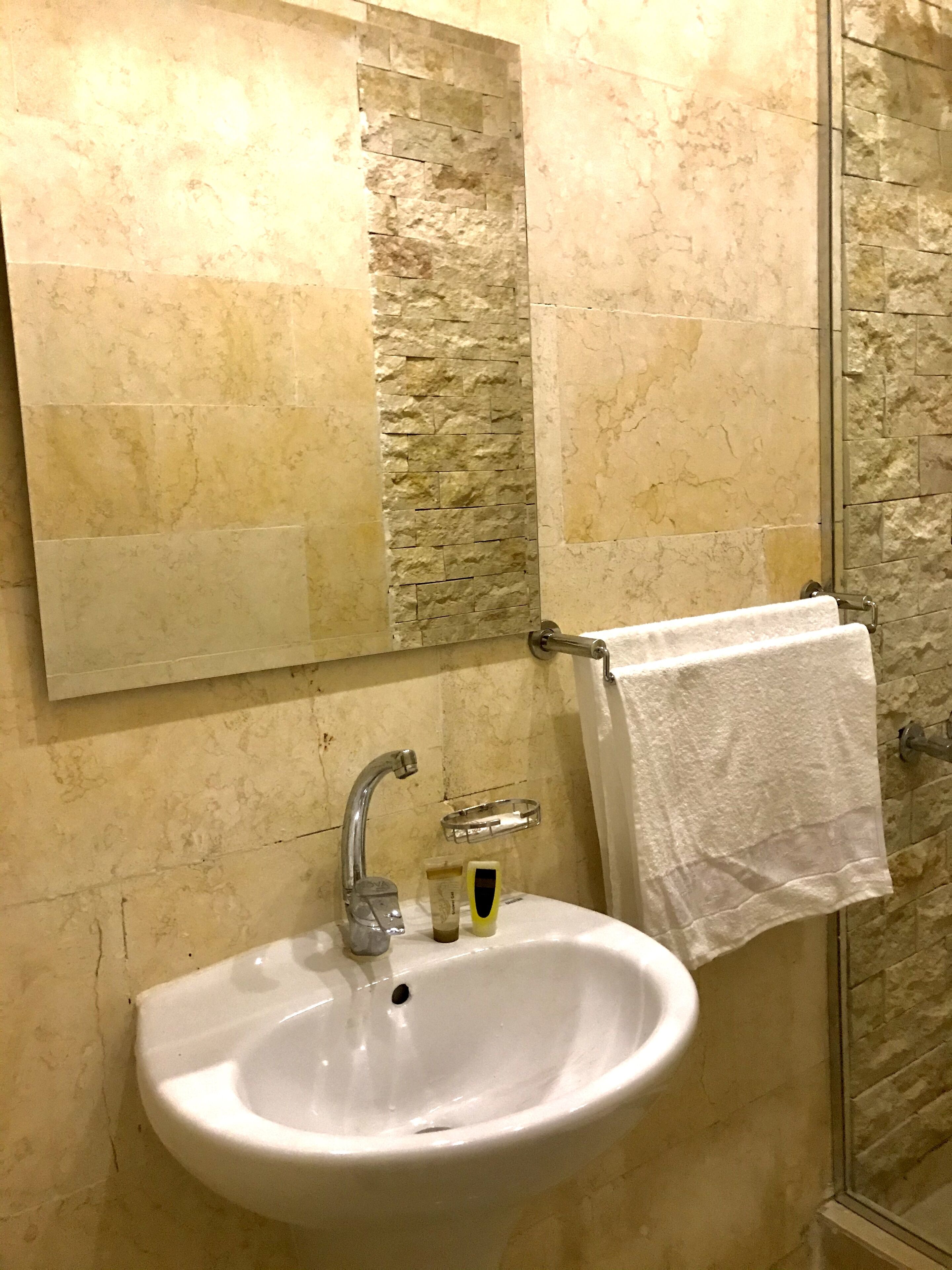 shower, rainfall showerhead, bathrobes, slippers