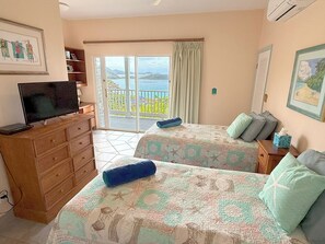 4 bedrooms, iron/ironing board, free WiFi, bed sheets - Experience the charm of Le Lapin – a family-friendly retreat featuring stunning dual views, a refreshing pool, and comfortable air conditioning. Perfect for unforgettable moments with loved ones! (St John)