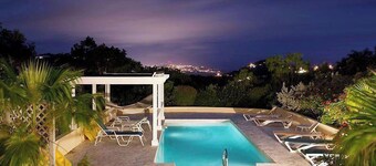 Experience the charm of Le Lapin – a family-friendly retreat featuring stunning dual views, a refreshing pool, and comfortable air conditioning. Perfect for unforgettable moments with loved ones!