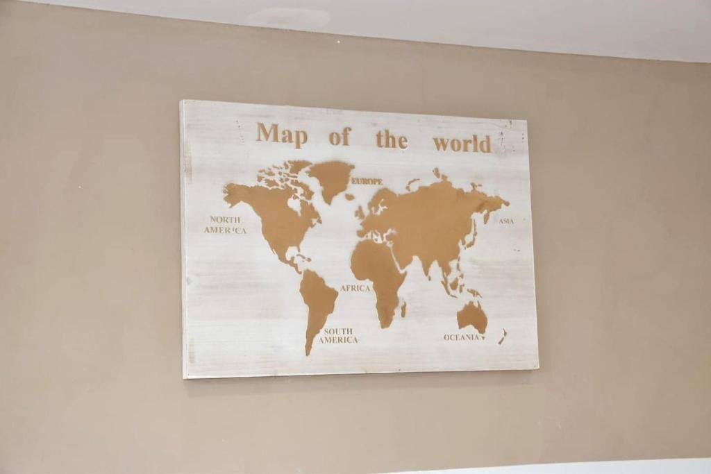 A world map on a wall.