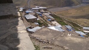 A mountainous village with houses and a river. - About house......... (Quba)