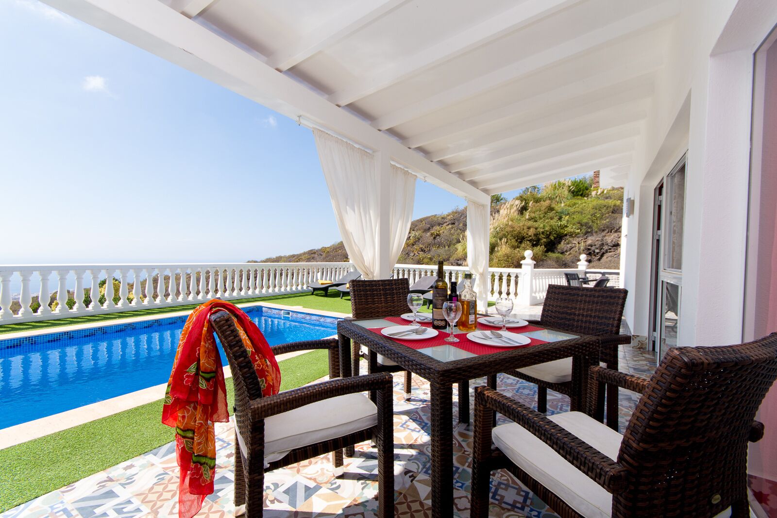 Eating area around private pool