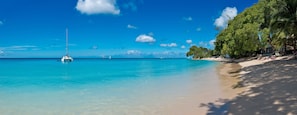 On the beach, sun loungers, beach towels