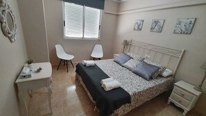 2 dormitorios, tabla de planchar con plancha, wifi gratis y ropa de cama