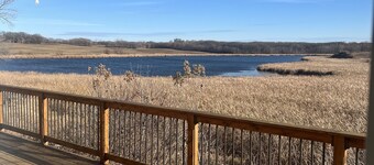 Sleeps groups to 12!  Modern open spaces.  Yoga loft. Deck. Kitchen. Peaceful.