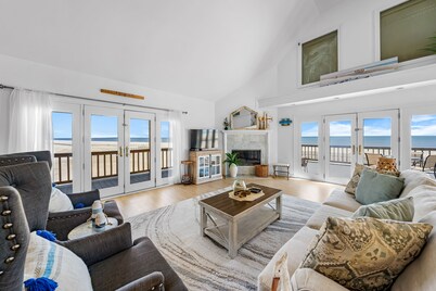 Dog-friendly beach house w/ stunning water views, wrap-around decks & a loft