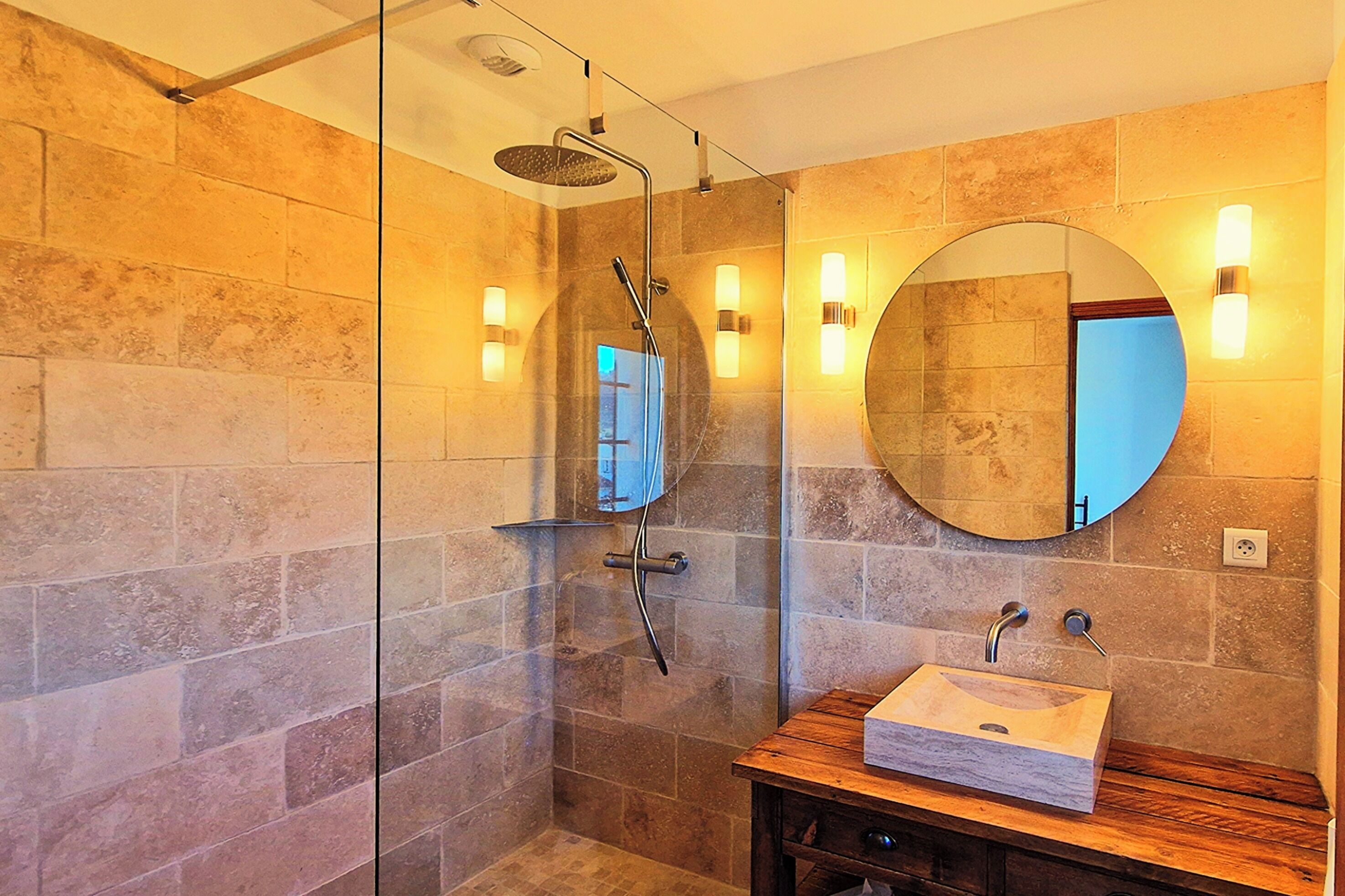 Bathtub, hair dryer, towels, soap