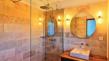 Bathtub, hair dryer, towels, soap