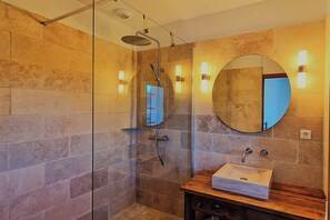 Bathtub, hair dryer, towels, soap